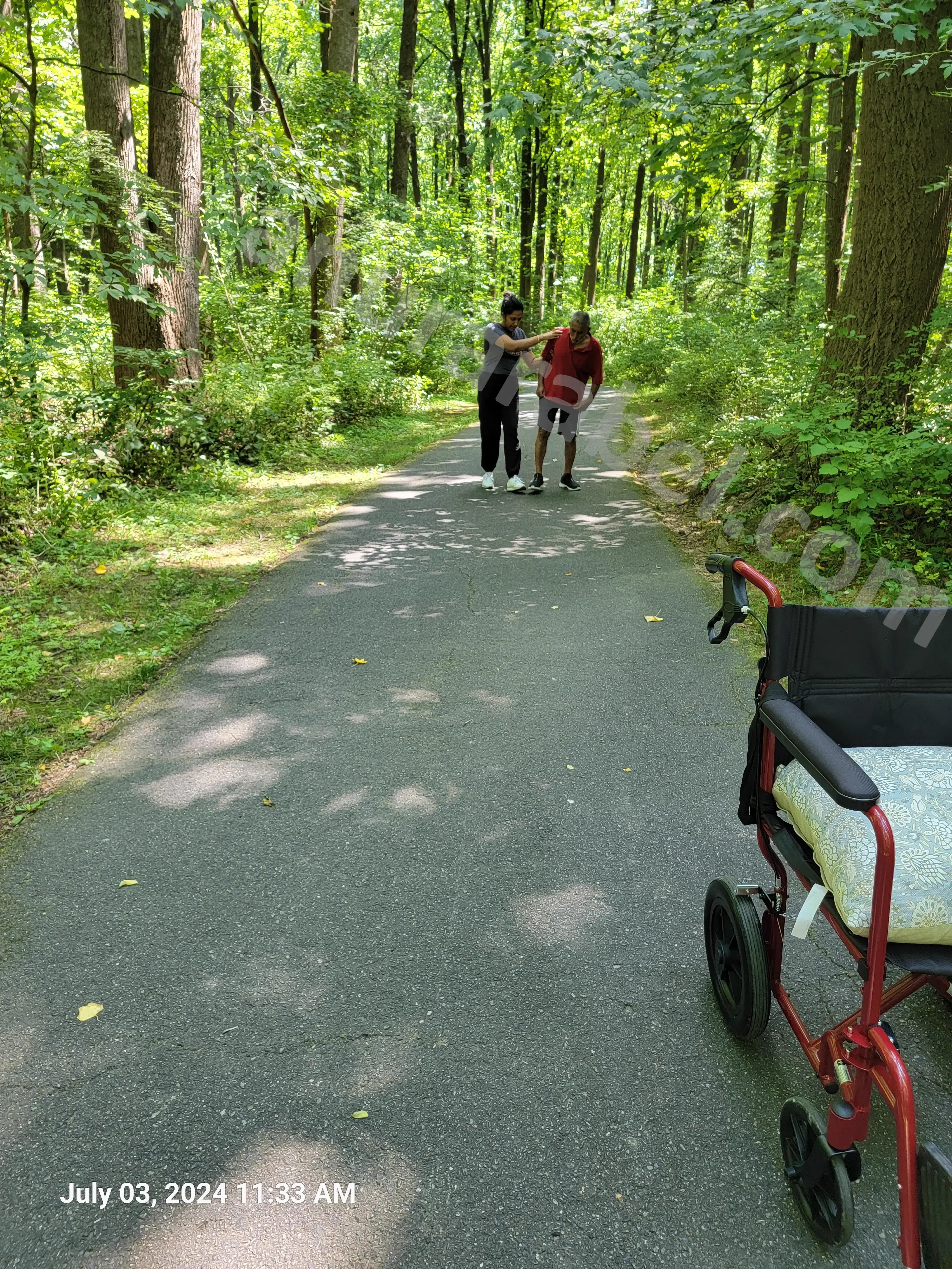 Ruwanthi and Chamara helping Tatha to learn how to walk at Wheaton Regional Park Trail in Weaton, Maryland